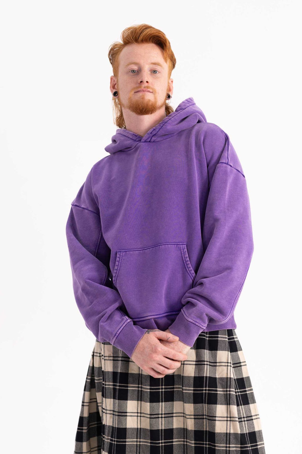 Front view of Matthijs wearing Achilles and the Tortoise  purple hoodie. Amsterdam sustainable streetwear.